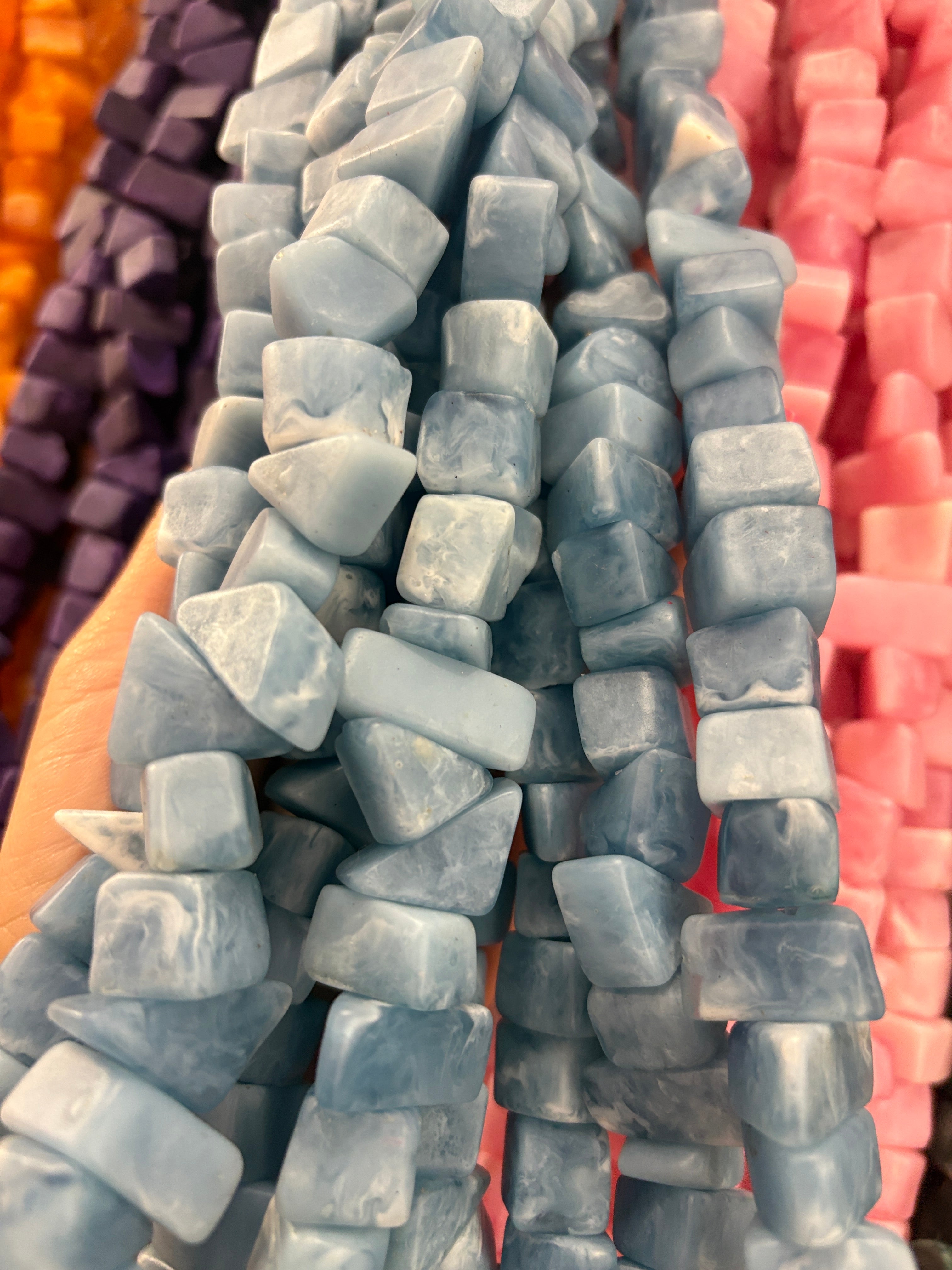 Resina beads