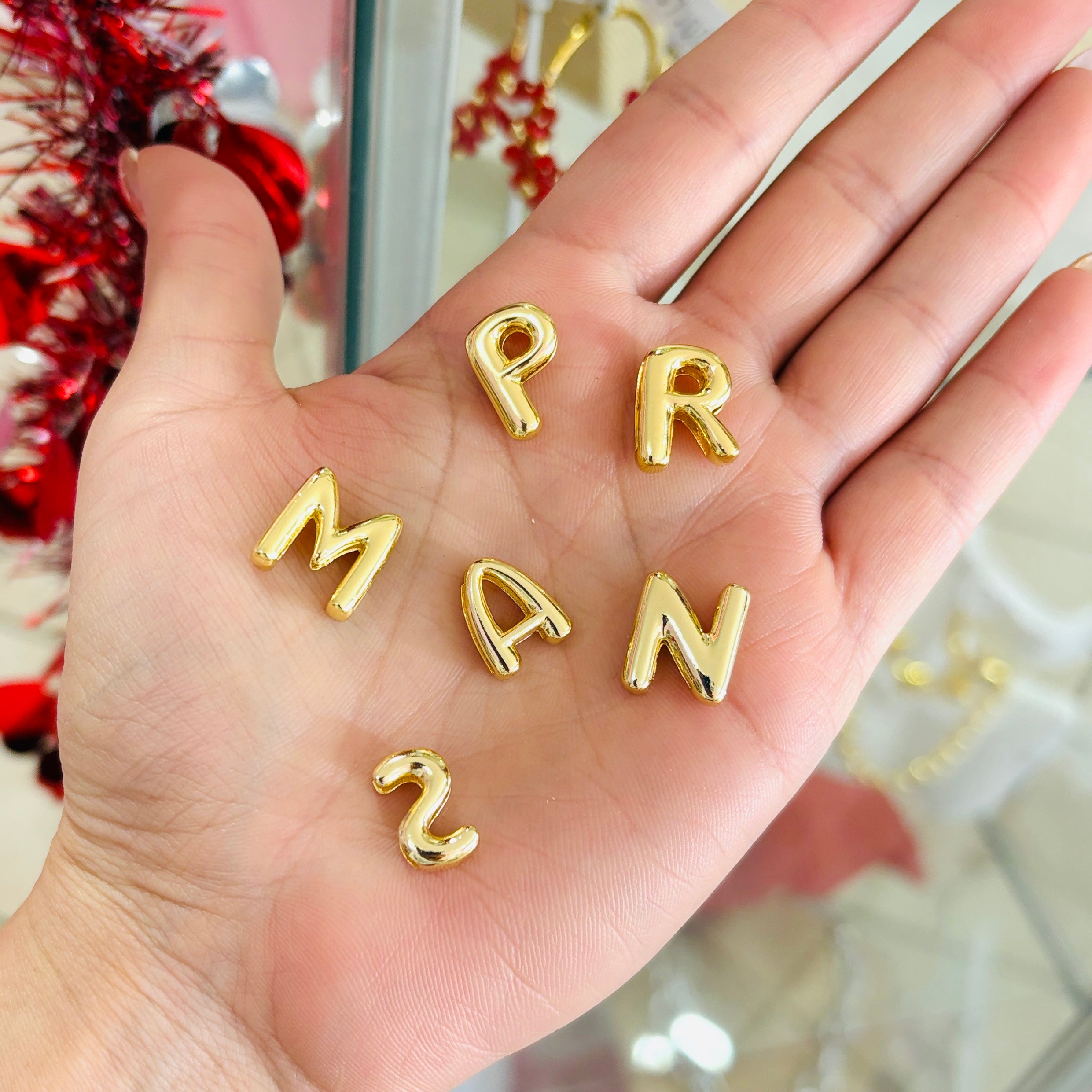 Letras enchapadas pasadores