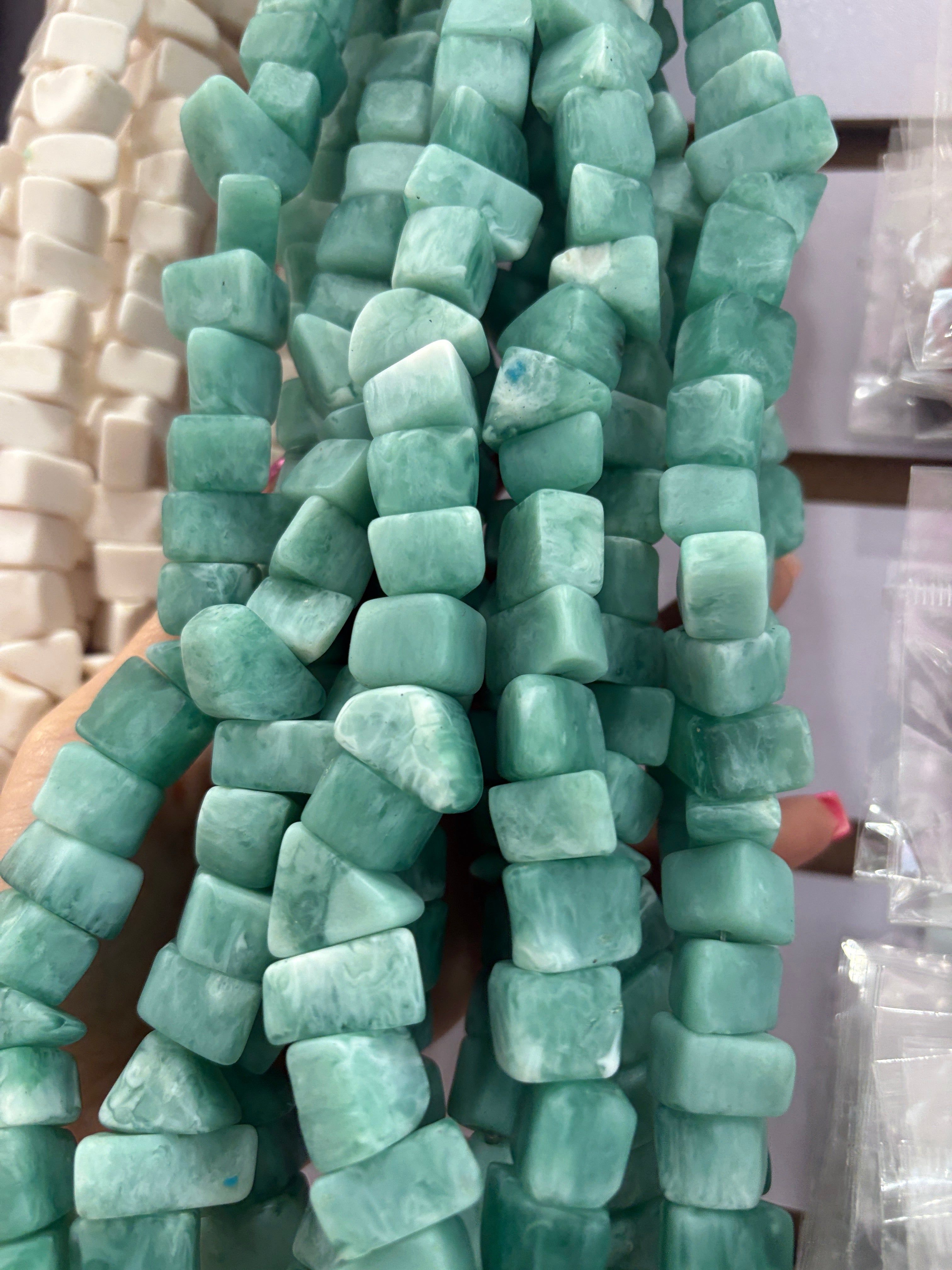 Resina beads