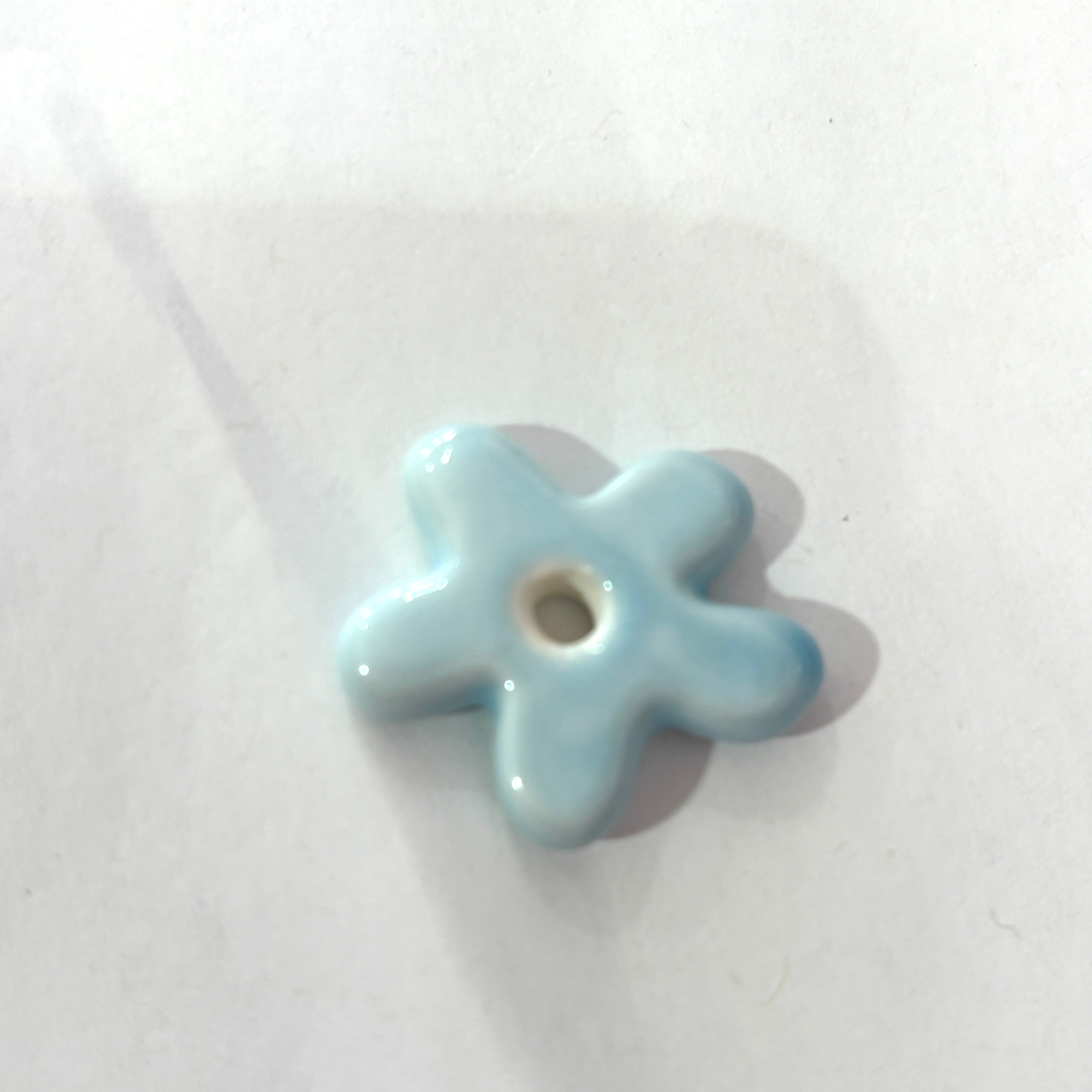Flor en porcelana