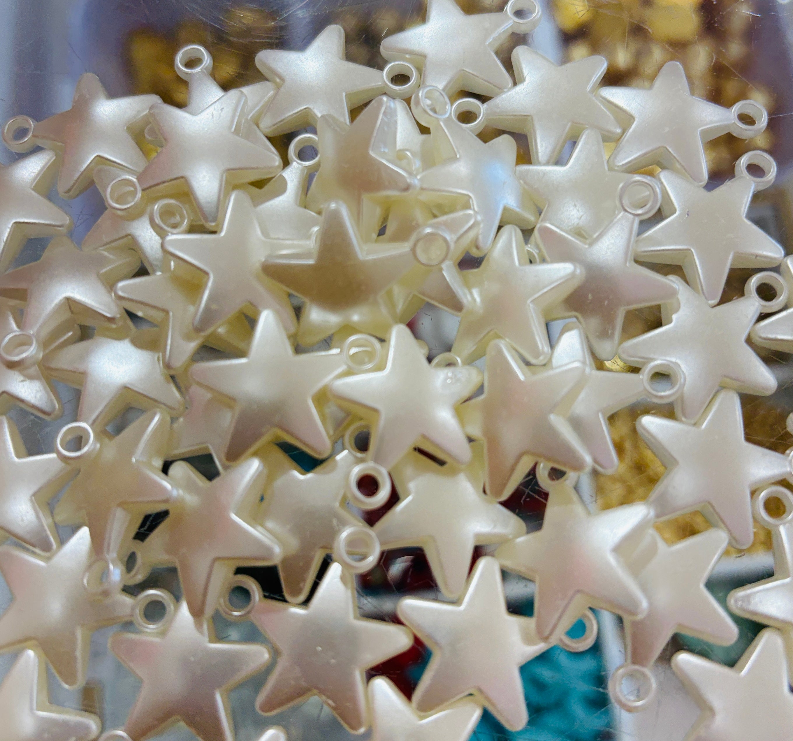 Estrellas colgante imitacion perla